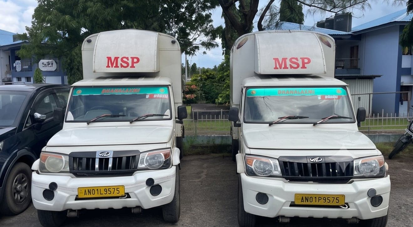 Two MSP vans parked side by side